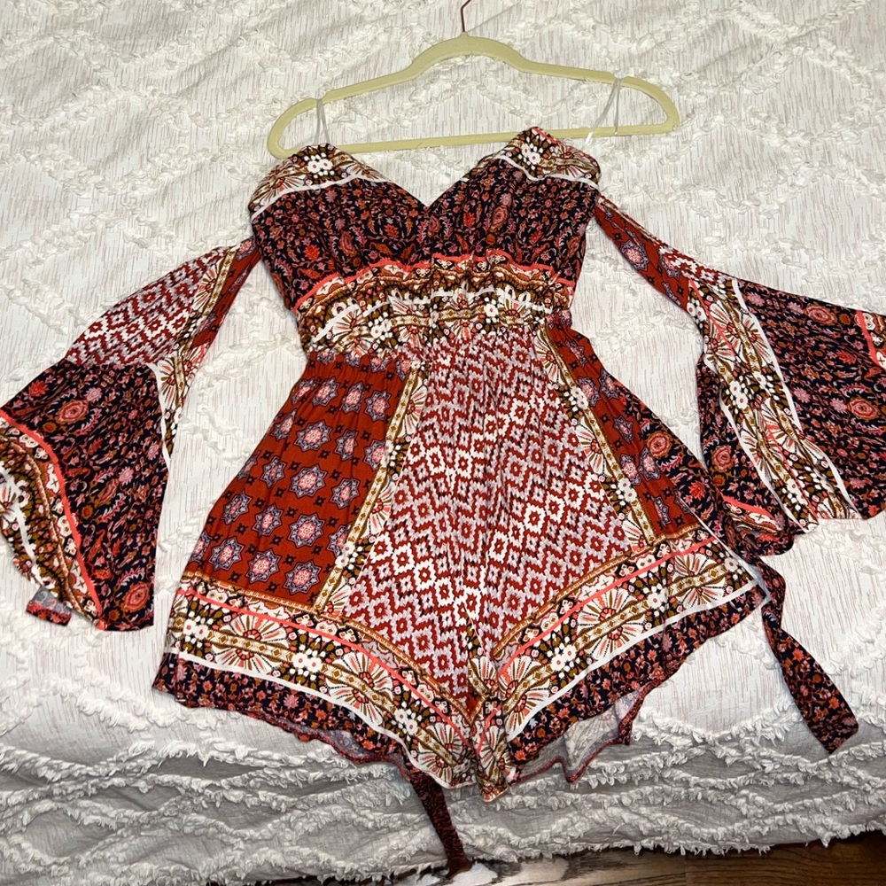 NWOT- Sister of the Tribe romper with fluted sleeves- size 8